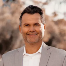 Matt Campbell, COO & Advisory Board Member at Lukrom, smiling outdoors with a blurred background